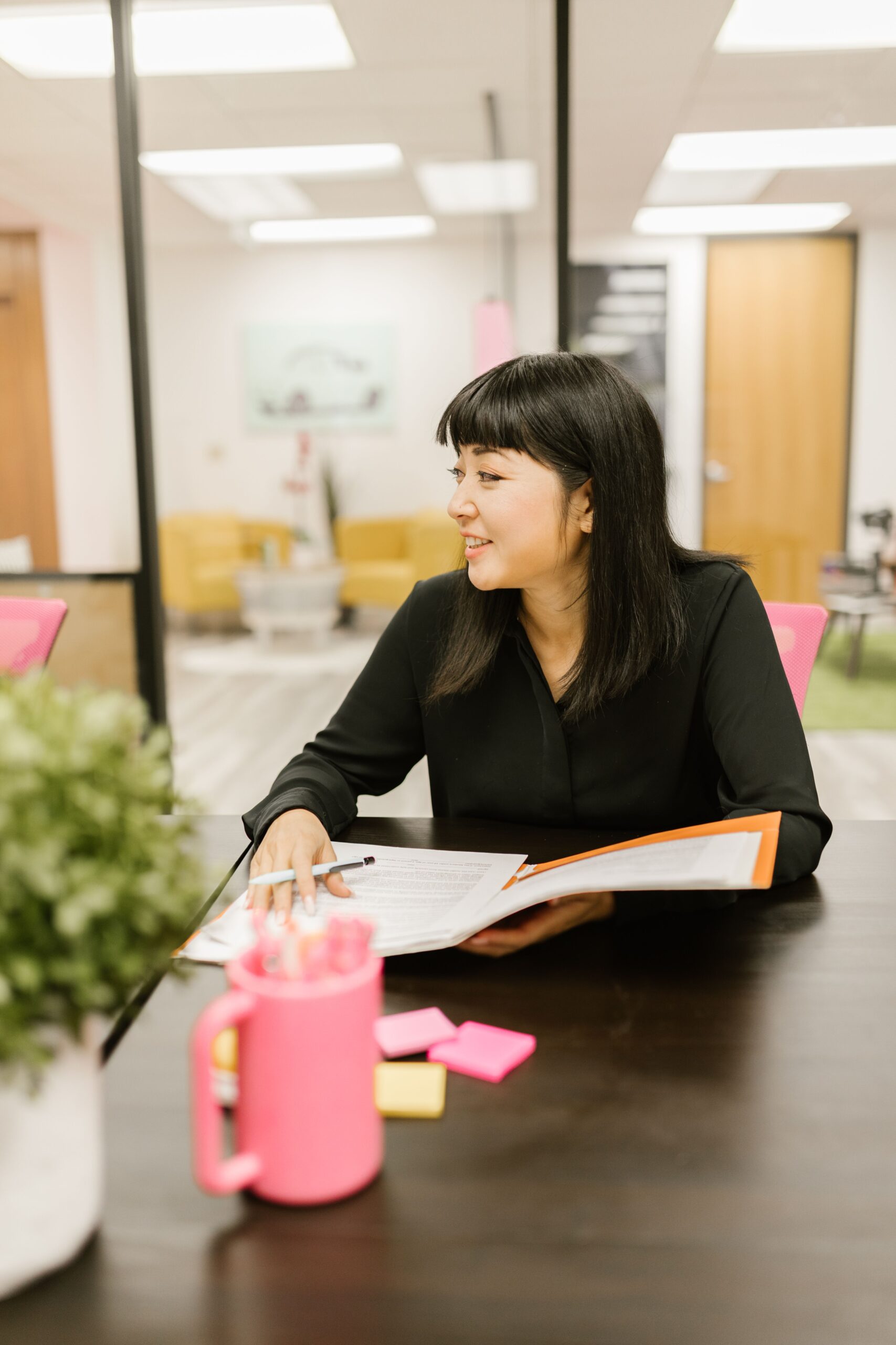Business owner working through documents and notes
